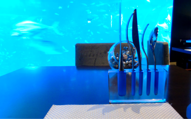 View of the aquarium tank from inside the Ocean Restaurant, Singapore A Date With Fishes